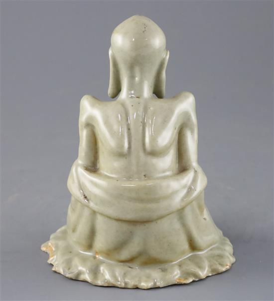 A Chinese celadon glazed figure of Laozi, 18th / 19th century, H.15.5cm, small area of restoration to left knee